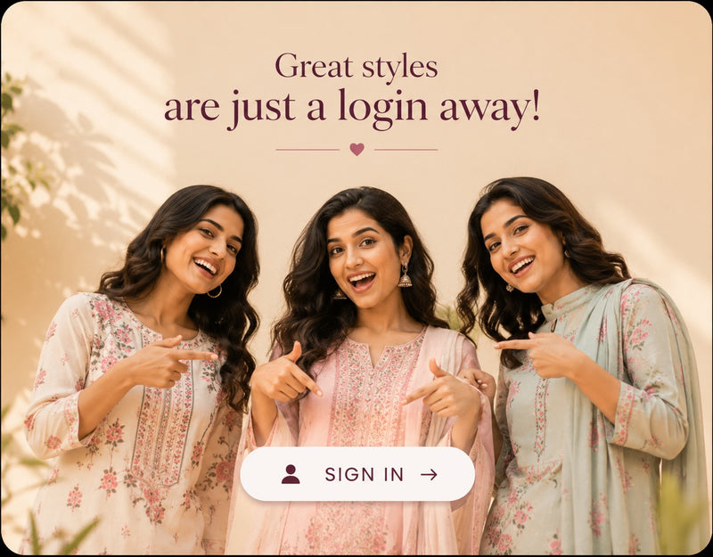 Three women wearing floral printed traditional outfits point toward a promotional message that reads 'Great styles are just a login away!' with a 'SIGN IN' button at the bottom on a warm beige background.